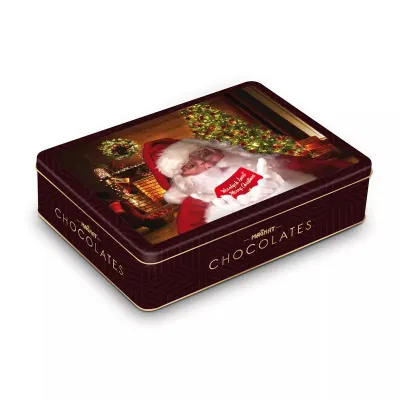 Пралине из молочного шоколада с карамельной начинкой и кусочками арахиса Merry Christmas 80гр. ж/б Magnat